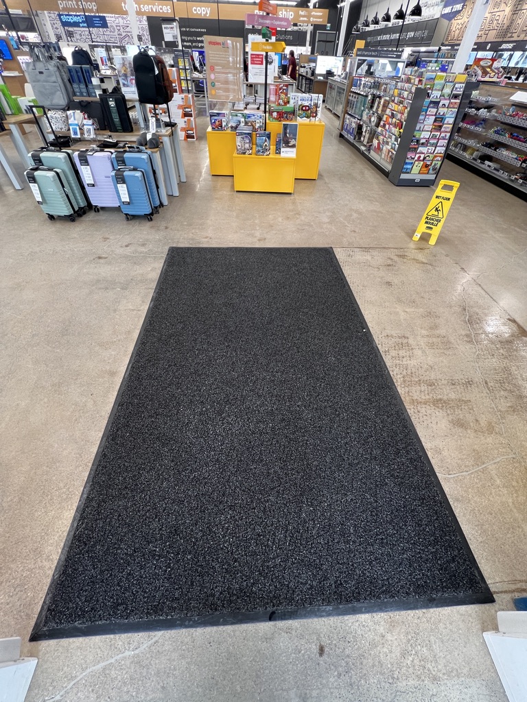 Clean commercial entrance mat after professional carpet service