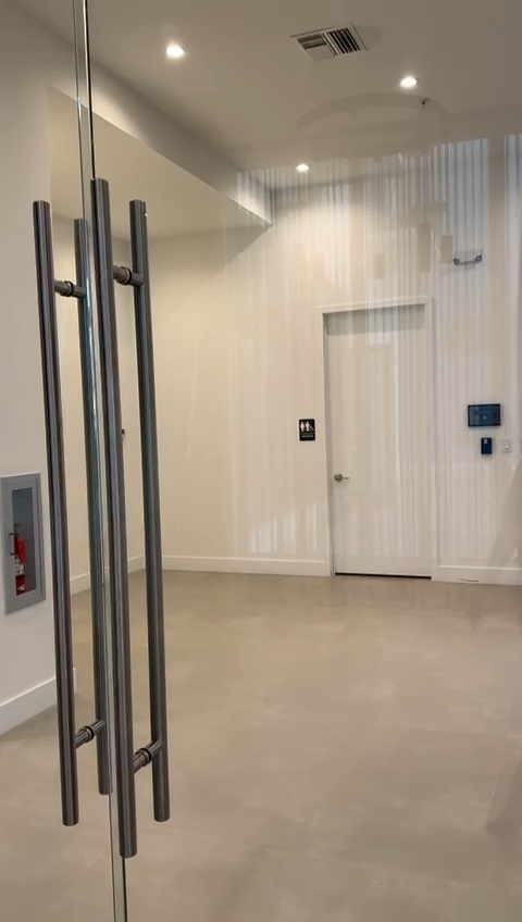 Close view of polished glass doors and clean hardware